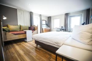 Postel nebo postele na pokoji v ubytování B&B Zum Schleif