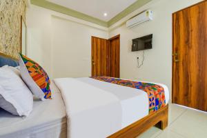 TV a/nebo společenská místnost v ubytování Hotel Bungalow 18