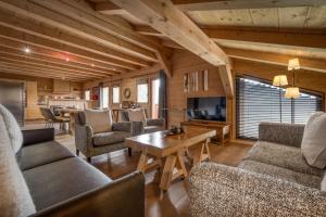 Posezení v ubytování Flocons de Sel - Relais & Chateaux