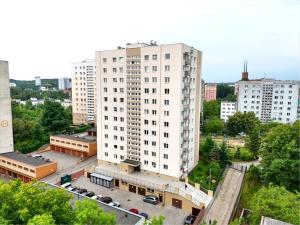 an overhead view of a large white building in a city at Cosy Studio Gdynia Kamienna Góra in Gdynia
