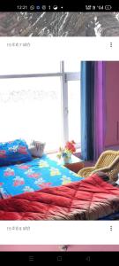 Ένα ή περισσότερα κρεβάτια σε δωμάτιο στο Ladon home stay