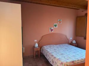 Кровать или кровати в номере Nuovo Agriturismo Angelini +15 фотографий