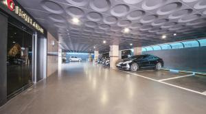 a parking garage with cars parked in it at Hotel Circle Yonghyeon in Incheon