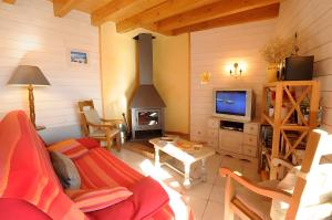 TV a/nebo společenská místnost v ubytování Madres Coronat