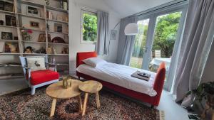 Postel nebo postele na pokoji v ubytování Garden Studio Eindhoven + 10 fotografií