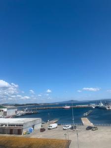 a view of a marina with boats in the water at Mar de Ría 2 in Ribeira