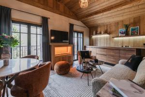 TV a/nebo společenská místnost v ubytování L'Écrin de Megève