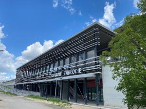 a building with a sign on the side of it at Studio LOFT right in the center in Skorka