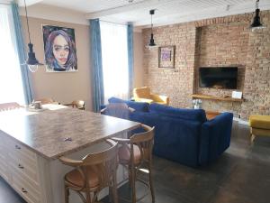 Et opholdsområde på Moderne, stilvolle Ferienwohnung in Stralsund 84m2