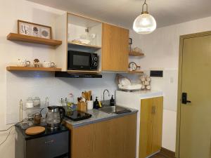 Kuchyň nebo kuchyňský kout v ubytování La Bella Suite Tuscania Towers + 3 fotografie