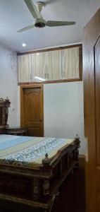 Postel nebo postele na pokoji v ubytování AL-SYED Apartments