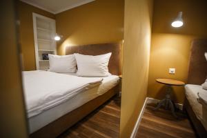 Postel nebo postele na pokoji v ubytování B&B Zum Schleif