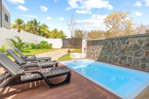 Bazén v ubytování Villa Rishra - Piscine Privée & Rooftop Vue Mer nebo v jeho okolí