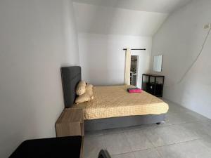 Katil atau katil-katil dalam bilik di Park side nest studio room 2