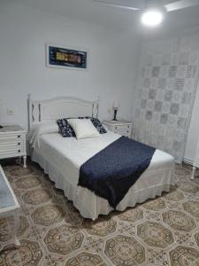 Postel nebo postele na pokoji v ubytování Ca la Glori
