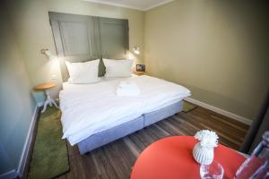Postel nebo postele na pokoji v ubytování B&B Zum Schleif