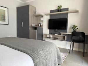 Kuchyň nebo kuchyňský kout v ubytování Sandton Guest Room at Middle