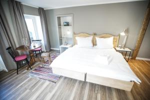 Postel nebo postele na pokoji v ubytování B&B Zum Schleif