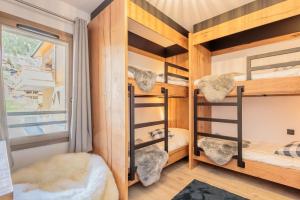 Ένα ή περισσότερα κρεβάτια σε δωμάτιο στο Hara-Kiri, superbe appartement avec terrasse vue montagne