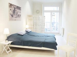 Postel nebo postele na pokoji v ubytování Ferienwohnung am Marktplatz - ABC609 + 10 fotografií