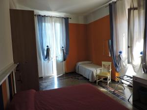 Postel nebo postele na pokoji v ubytování Albergo La Vela