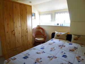 Voodi või voodid majutusasutuse Kranichüberflug toas