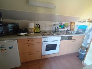 Köök või kööginurk majutusasutuses Kranichüberflug