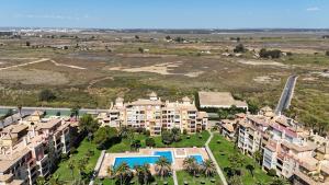 an aerial view of an apartment complex at Alcaraván, Isla Canela - By AC REAL in Isla Canela