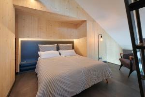 Ένα ή περισσότερα κρεβάτια σε δωμάτιο στο Ferienhaus Klar zur Wende +14 φωτογραφίες
