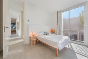 Ένα ή περισσότερα κρεβάτια σε δωμάτιο στο Villamar - Stunning Beachfront +18 φωτογραφίες