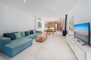 Μια τηλεόραση ή/και κέντρο ψυχαγωγίας στο Villamar - Stunning Beachfront