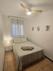 Katil atau katil-katil dalam bilik di Apartamento Alma Salada