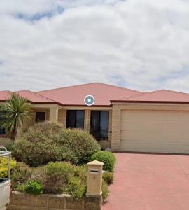 a house with a pink roof and a garage at Forrest River Escape on Evans, Star-link & 4 bed, Motel Style rooms in Collie +7 photos
