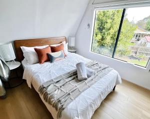 Photo de la galerie de l'établissement Coastal A-Frame Hideaway, à Hastings