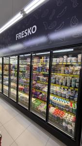 a grocery store display case with food and eggs at Palita Vita - Durrës Beach in Durrës