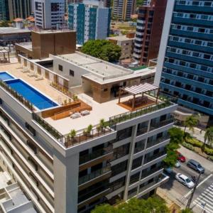 an overhead view of a building with a swimming pool at Apto Novo PraiaTambaúCabo Branco in João Pessoa