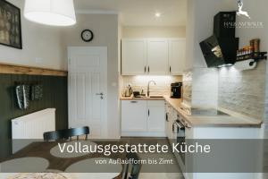 Η κουζίνα ή μικρή κουζίνα στο Familienurlaub pur III KINDER UND JUGENDLICHE bis 17 frei III HUND willkommen III SAUNA im Haus III Natur direkt vor der Tür III nah an Winterberg für Ski Wandern und Abenteuer