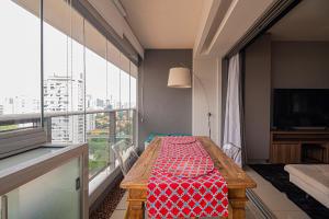 Гостиная зона в Nude Stay- Famoso Habitarte Brooklin- P - 4 pessoas