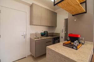 Кухня или мини-кухня в Nude Stay- Famoso Habitarte Brooklin- P/ 3 pessoas
