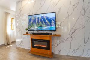Μια τηλεόραση ή/και κέντρο ψυχαγωγίας στο Villa Monaco RD