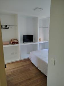 Ένα ή περισσότερα κρεβάτια σε δωμάτιο στο Apartamento 3 dormitórios Granja Viana