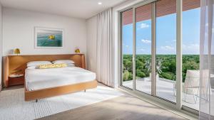 Ένα ή περισσότερα κρεβάτια σε δωμάτιο στο ONE GT Grand Cayman +28 φωτογραφίες