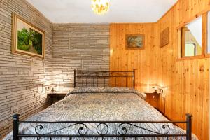 Ένα ή περισσότερα κρεβάτια σε δωμάτιο στο Casa Vacanza Famiglia Belli