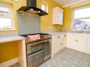 Η κουζίνα ή μικρή κουζίνα στο The Manse