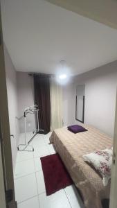 Postel nebo postele na pokoji v ubytování Apartamento 2 quartos + 9 fotografií