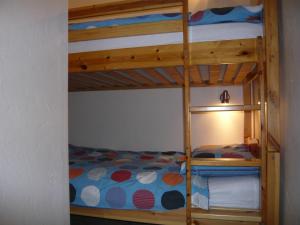 En eller flere senge i et værelse på Aravis Sports 29 + 4 billeder