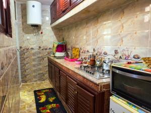 a kitchen with a counter top and a sink at vintage in Fez