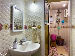 a bathroom with a sink and a mirror at vintage in Fez +13 photos