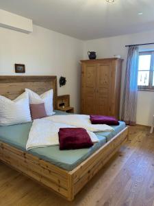 Postel nebo postele na pokoji v ubytování Winkelfeldhof