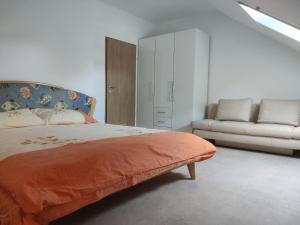 Voodi või voodid majutusasutuse Apartments - RX toas +4 fotot